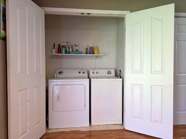 935 Fry Rd, Greenwood, IN 46142 - laundry room with separate washer and dryer and light wood-type flooring