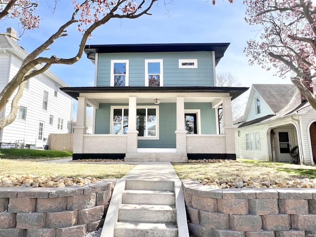 1505 High St, Logansport, IN 46947 - american foursquare style home featuring covered porch