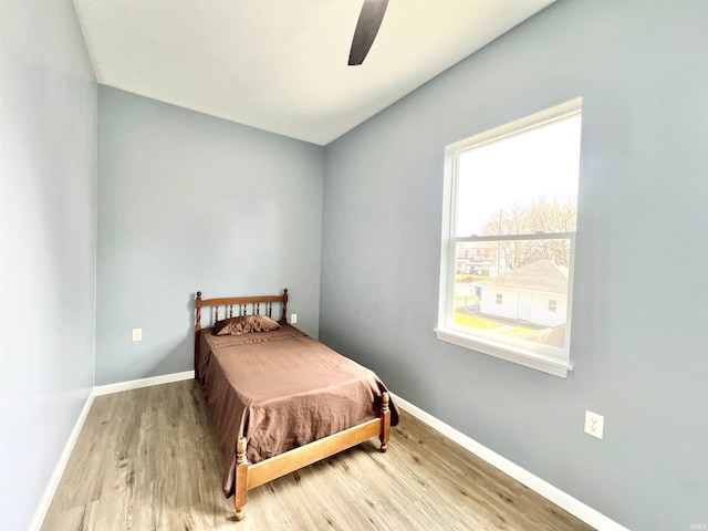 1505 High St, Logansport, IN 46947 - bedroom featuring wood finished floors, baseboards, and ceiling fan
