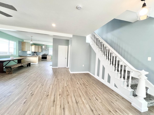1505 High St, Logansport, IN 46947 - living room with stairway, baseboards, light wood-style floors, and recessed lighting
