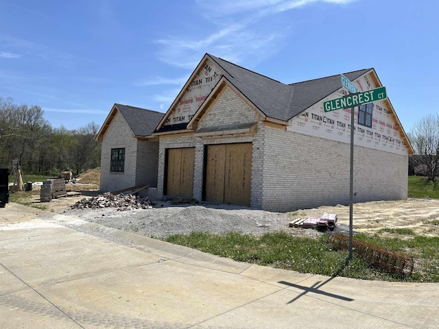 6021 Glencrest Ct, Newburgh, IN 47630 - view of front of home with brick siding and roof with shingles