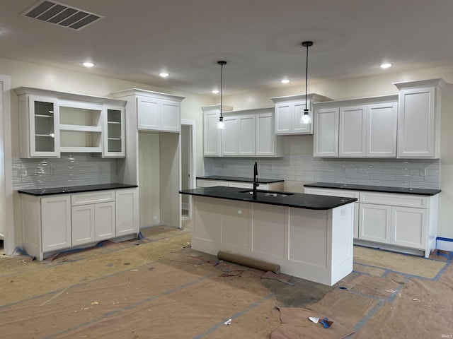 6021 Glencrest Ct, Newburgh, IN 47630 - kitchen featuring a sink, dark countertops, backsplash, open shelves, and white cabinetry