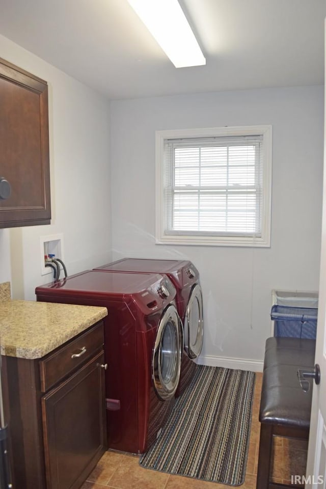 3201 Helmsford Ct, Evansville, IN 47715 - clothes washing area with washing machine and dryer and cabinet space