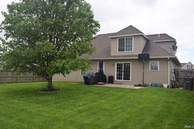 3201 Helmsford Ct, Evansville, IN 47715 - rear view of property with a yard, roof with shingles, a patio, and fence