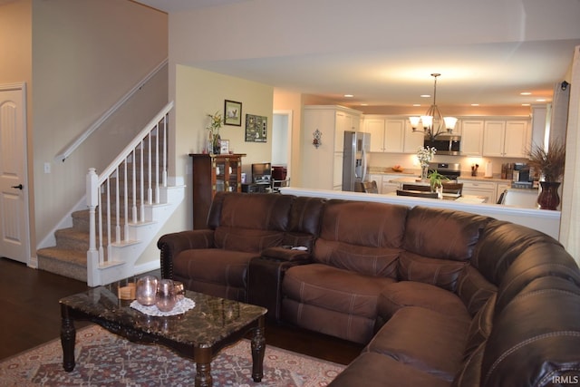 3201 Helmsford Ct, Evansville, IN 47715 - living room with stairway, a notable chandelier, dark wood-type flooring, and recessed lighting