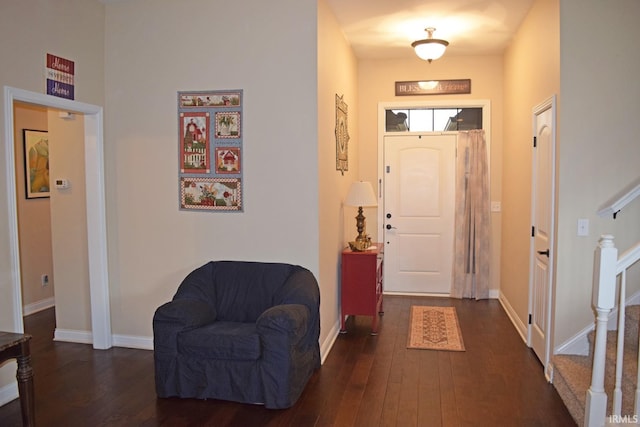 3201 Helmsford Ct, Evansville, IN 47715 - entrance foyer with dark wood finished floors, baseboards, and stairs