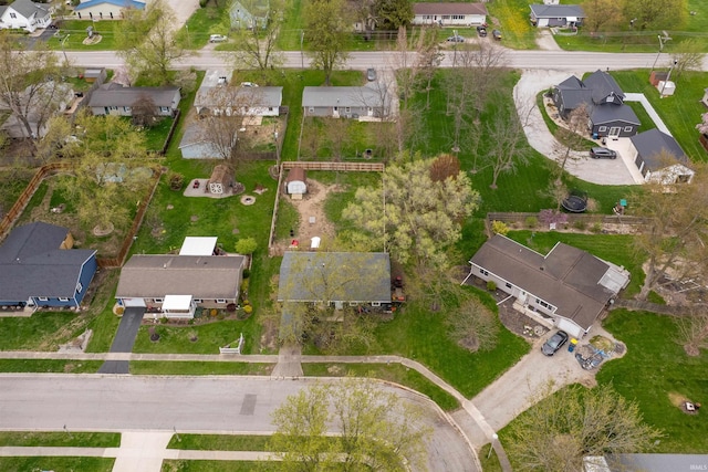 birds eye view of property with a residential view