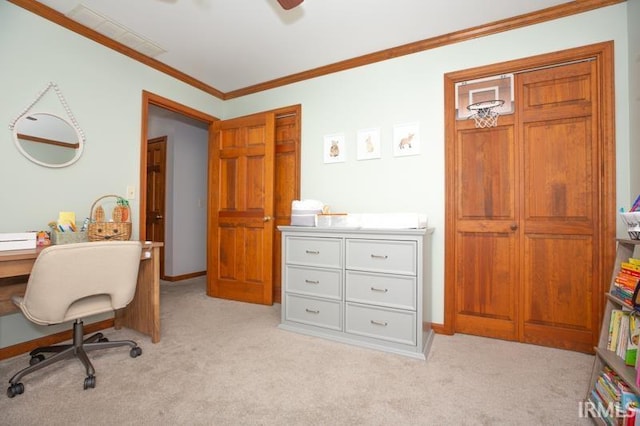 office featuring a ceiling fan, light carpet, crown molding, and baseboards