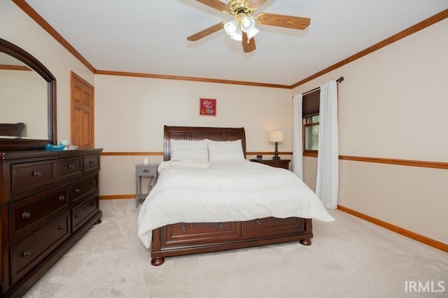 bedroom featuring a ceiling fan, baseboards, ornamental molding, and light colored carpet