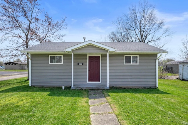 357 Mount Auburn St, Dunkirk, IN 47336 - view of front of house featuring a shingled roof and a front yard