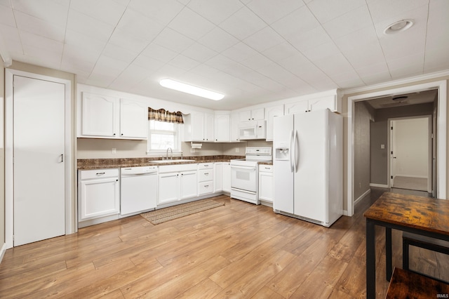 357 Mount Auburn St, Dunkirk, IN 47336 - kitchen featuring white cabinets, dark countertops, a sink, and white appliances