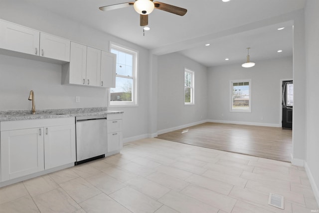kitchen with recessed lighting, a ceiling fan, stainless steel dishwasher, and white cabinets