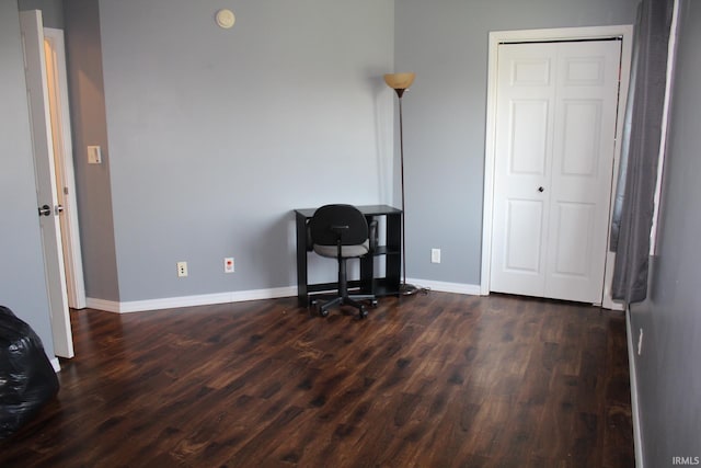office featuring baseboards and dark wood-style floors