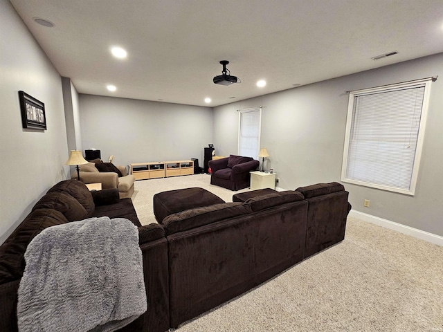 interior space with recessed lighting, carpet, visible vents, and baseboards