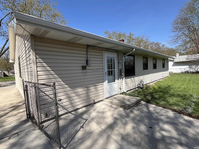 exterior space with a yard and a patio area