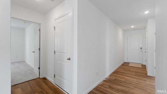 3353 Sika Trl, Waterloo, IN 46793 - hallway with wood finished floors and recessed lighting