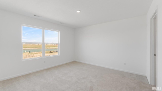 3353 Sika Trl, Waterloo, IN 46793 - unfurnished room featuring light colored carpet and recessed lighting