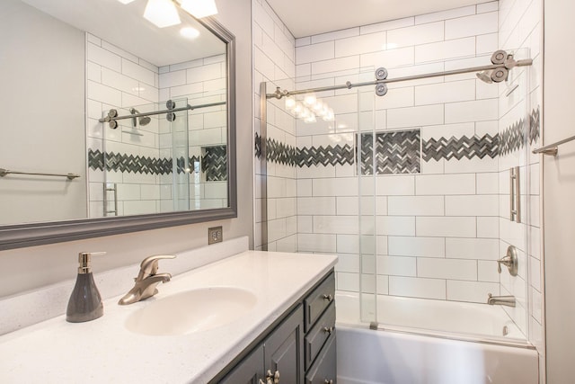 full bathroom with enclosed tub / shower combo and vanity