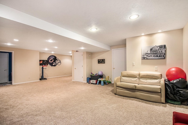 living room with a textured ceiling, recessed lighting, baseboards, and carpet floors