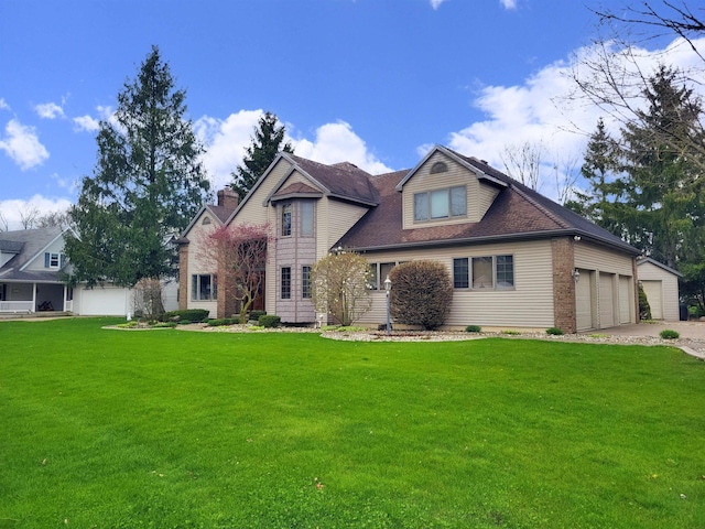 craftsman inspired home featuring a garage, driveway, and a front lawn
