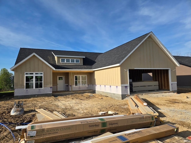 4026 W Carmola Dr, Bloomington, IN 47404 - view of front facade with a shingled roof
