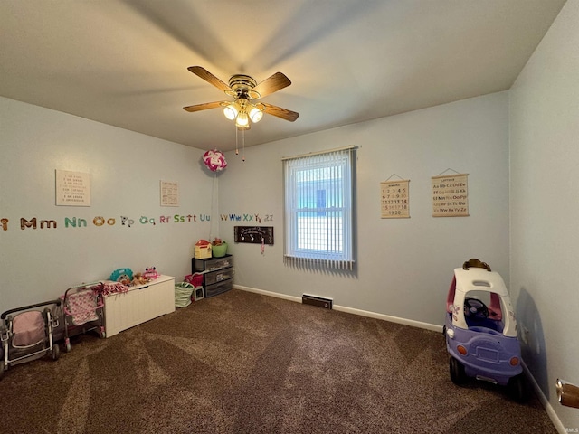rec room with ceiling fan, carpet floors, and baseboards