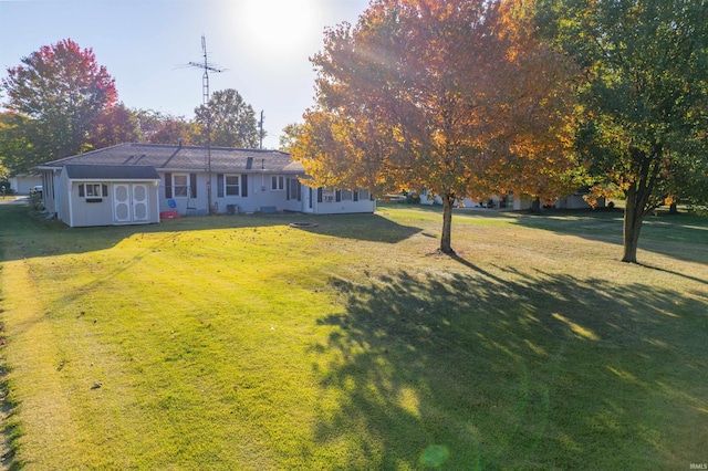 view of front of home with a front lawn