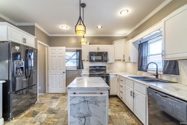 kitchen with white cabinets, a center island, a sink, stone finish flooring, and black appliances