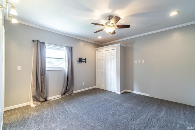 unfurnished bedroom with crown molding, a ceiling fan, a closet, dark colored carpet, and recessed lighting