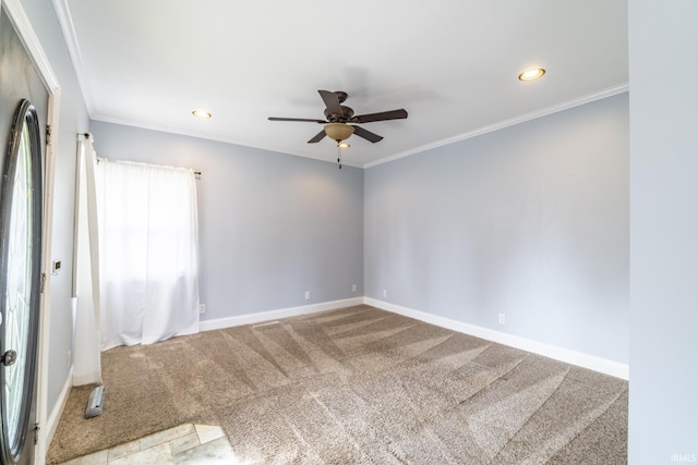 carpeted spare room featuring baseboards, a ceiling fan, crown molding, and recessed lighting