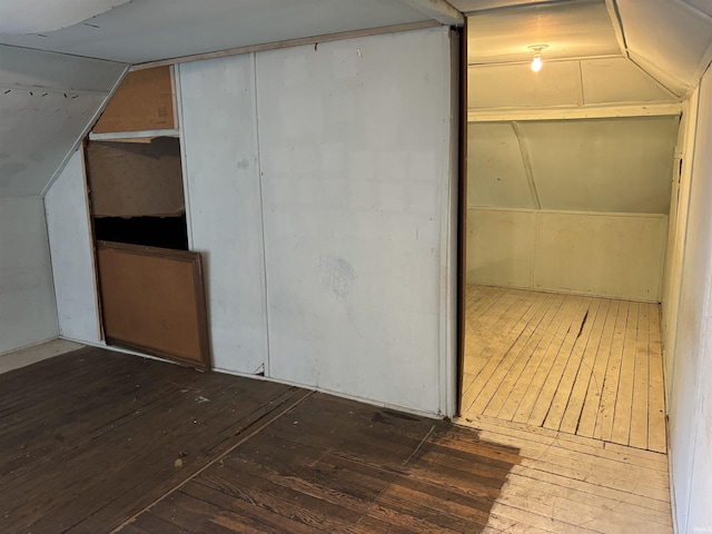 interior space featuring vaulted ceiling and hardwood / wood-style floors