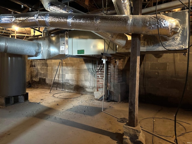 basement featuring concrete block wall