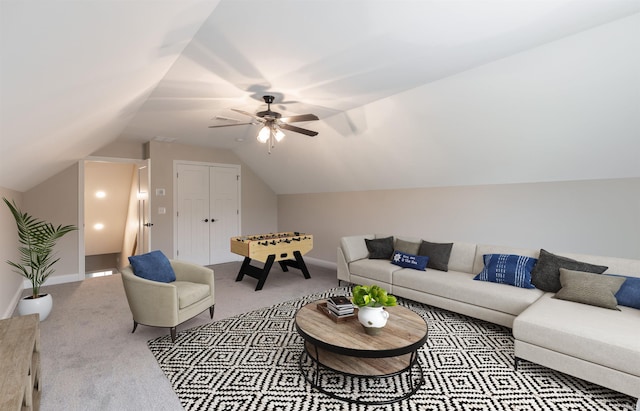 1033 Triple Crown Dr, Evansville, IN 47725 - carpeted living room featuring baseboards, a ceiling fan, and lofted ceiling