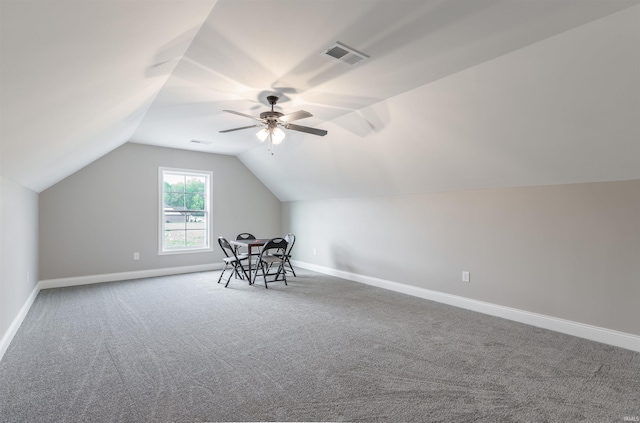 1033 Triple Crown Dr, Evansville, IN 47725 - additional living space featuring vaulted ceiling, visible vents, baseboards, and carpet