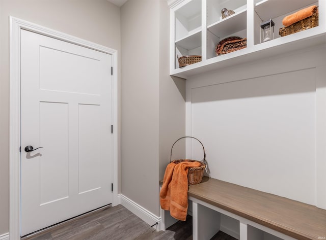 1033 Triple Crown Dr, Evansville, IN 47725 - mudroom featuring baseboards and wood finished floors