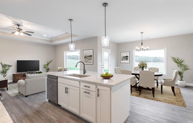 1033 Triple Crown Dr, Evansville, IN 47725 - kitchen featuring a sink, stainless steel dishwasher, and light wood finished floors