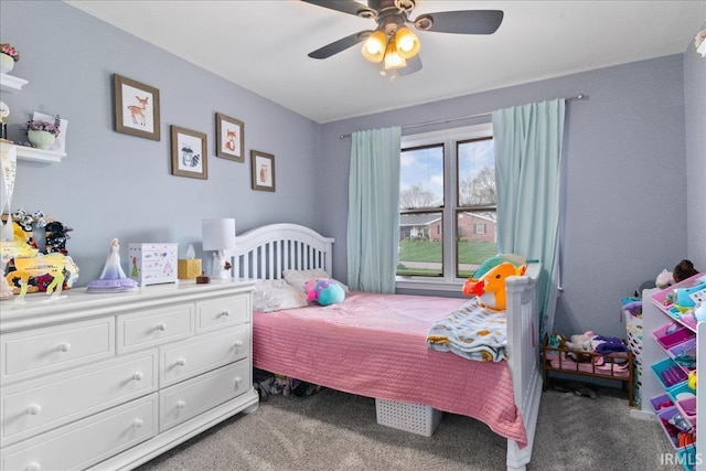 carpeted bedroom with a ceiling fan