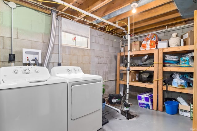 washroom with washer and clothes dryer and laundry area
