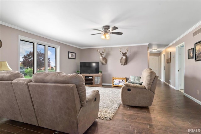 living room with a ceiling fan, dark wood-style floors, and ornamental molding