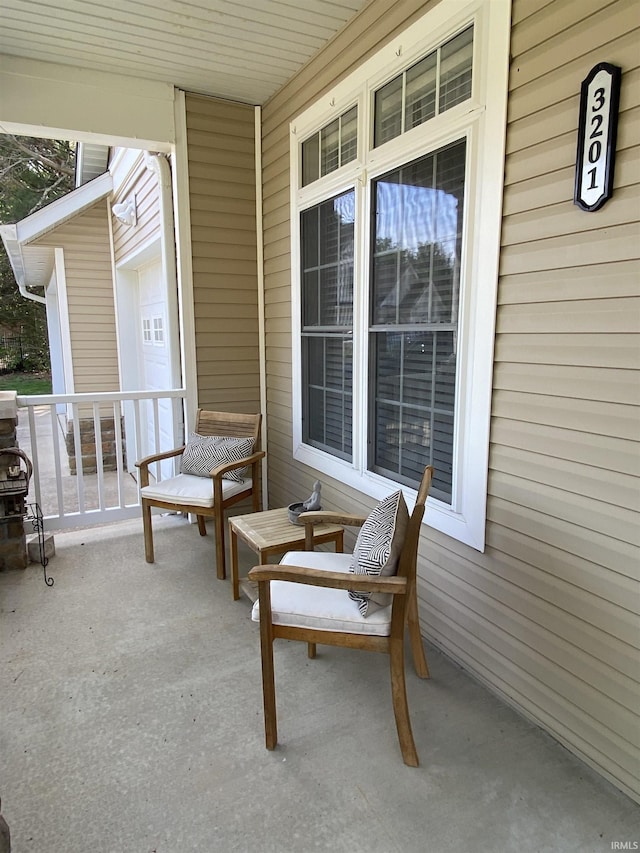 3201 E Kristen Ct, Bloomington, IN 47401 - view of patio / terrace with a porch