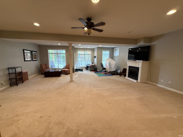 3201 E Kristen Ct, Bloomington, IN 47401 - living room featuring carpet flooring, baseboards, recessed lighting, ceiling fan, and a fireplace