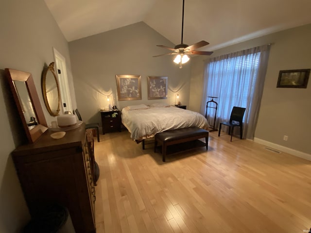 3201 E Kristen Ct, Bloomington, IN 47401 - bedroom featuring light wood-style flooring, lofted ceiling, baseboards, and a ceiling fan