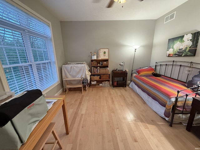 3201 E Kristen Ct, Bloomington, IN 47401 - bedroom with visible vents, light wood finished floors, baseboards, and ceiling fan
