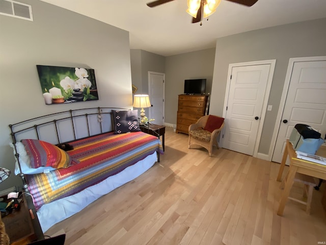 3201 E Kristen Ct, Bloomington, IN 47401 - bedroom featuring baseboards, visible vents, and light wood-type flooring