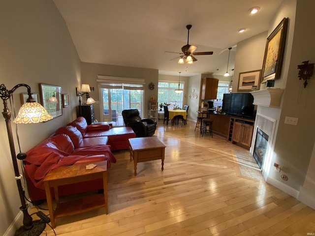3201 E Kristen Ct, Bloomington, IN 47401 - living area featuring plenty of natural light, light wood-type flooring, baseboards, and ceiling fan