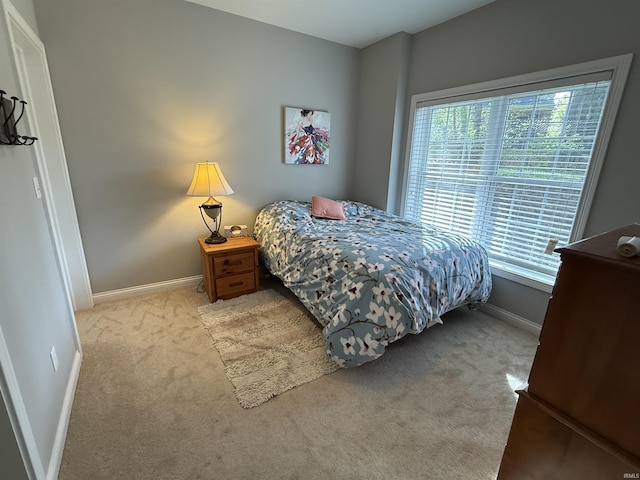3201 E Kristen Ct, Bloomington, IN 47401 - carpeted bedroom with baseboards
