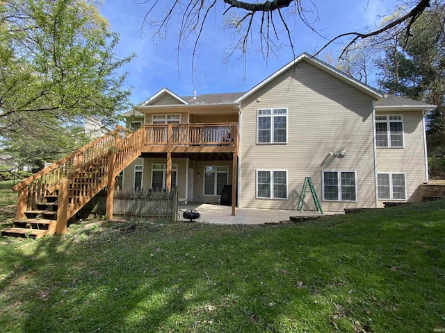 3201 E Kristen Ct, Bloomington, IN 47401 - rear view of house featuring stairs, a lawn, a patio, and a deck