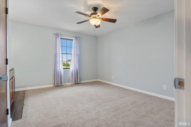 1689 E 550 Rd S, Peru, IN 46970 - carpeted spare room featuring baseboards and ceiling fan