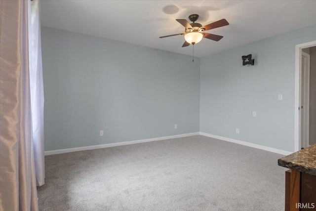1689 E 550 Rd S, Peru, IN 46970 - carpeted empty room featuring baseboards and a ceiling fan