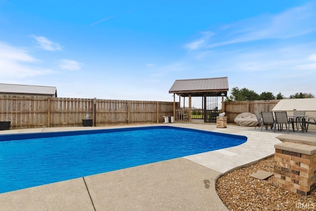 1689 E 550 Rd S, Peru, IN 46970 - view of swimming pool with a fenced backyard, a patio, and a fenced in pool